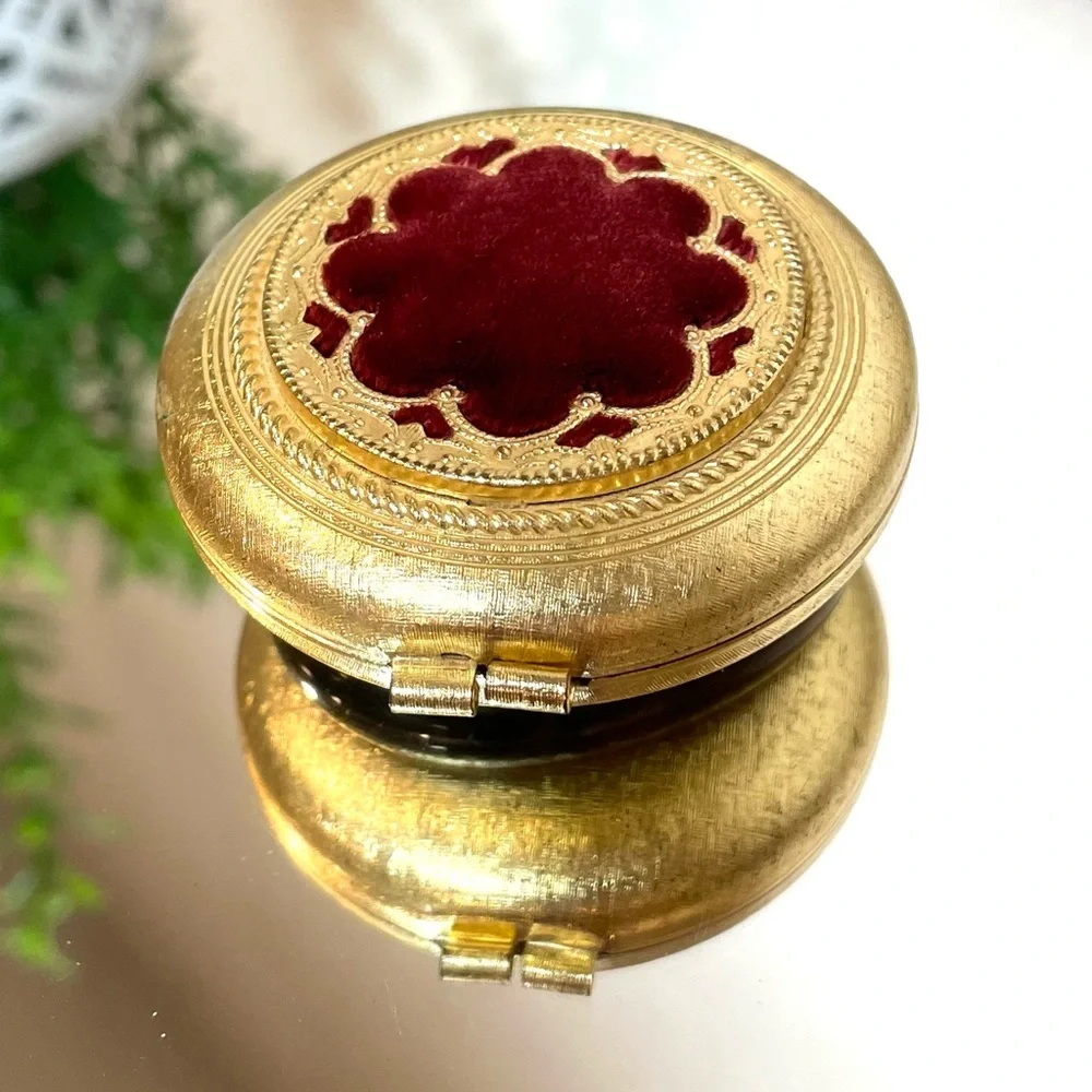 Vintage Revlon “Love Pat” Gold-tone Powder Compact with Burgundy Velvet Accent.